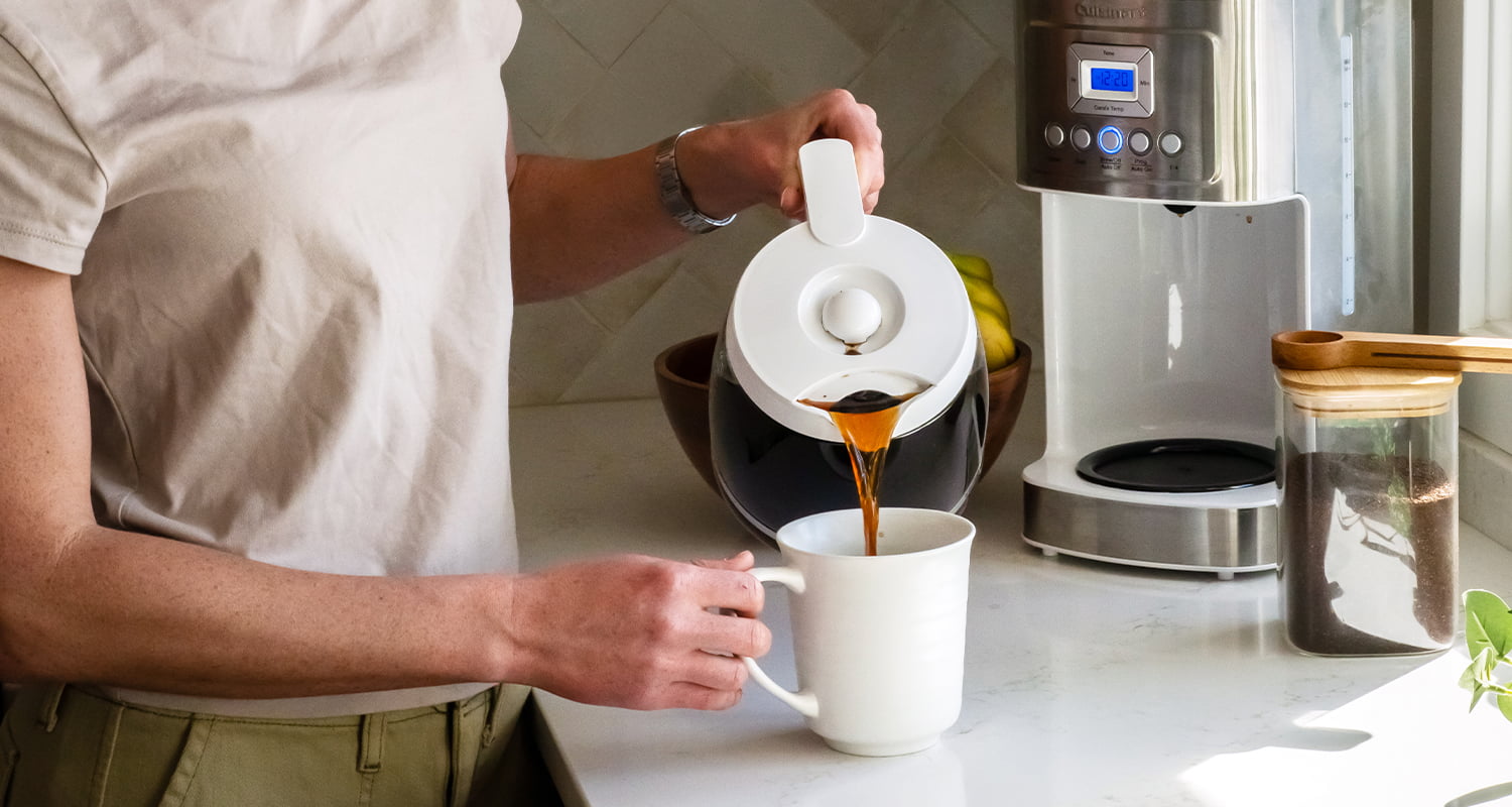 person pouring coffee