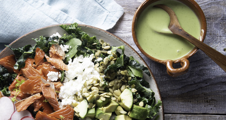 kale salad with salmon and green dressing