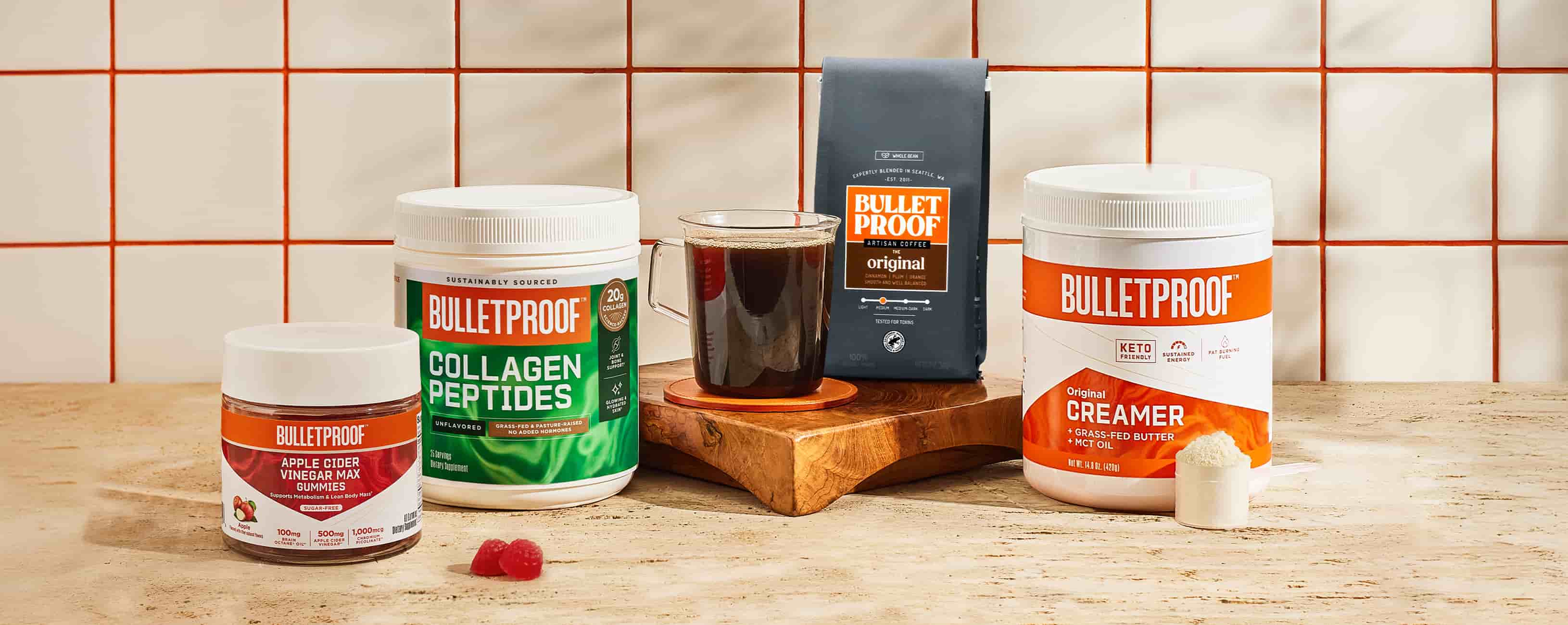 Bulletproof coffee, collagen and MCT oil products showcased on tabletop